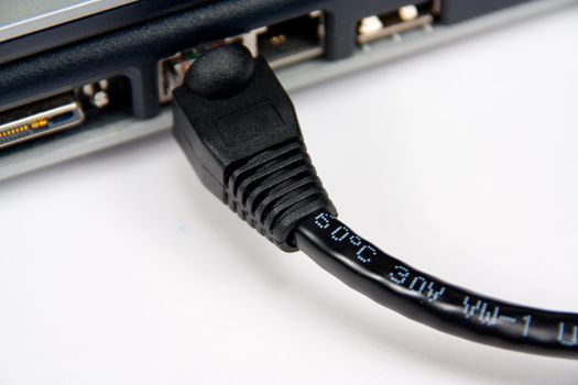 Ethernet cable connected to a laptop