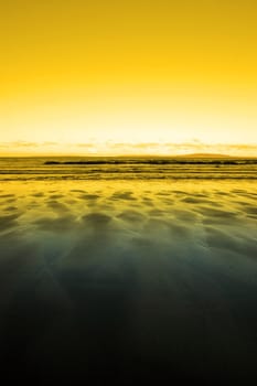 a sunset view of the beach in ballybunion co kerry ireland on a cold winters day