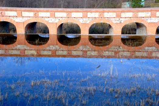 Reconstruction of an ancient dam archs