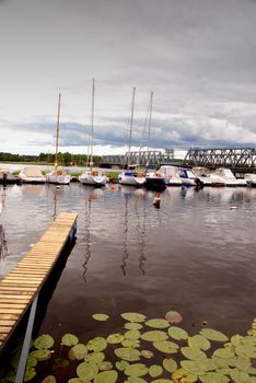 Lakeside jachts dock in quiet summer day