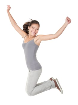 Jumping people isolated on white background: casual woman jumping happy and free in full body. Beautiful Caucasian Asian model smiling.