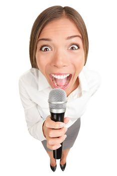 Businesswoman screaming / talking in microphone. Funny photo of young casual business woman holding microphone. Asian Caucasian female model isolated on white background.