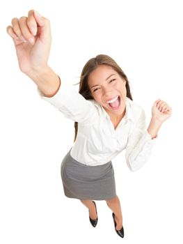 Success. Successful businesswoman cheering and dancing celebrating victory. Dynamic high angle view of young beautiful mixed race Asian Caucasian casual business woman. Isolated on white background in full body.