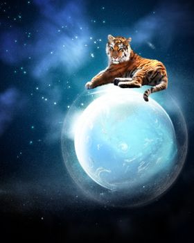 a tiger is sitting protectively on a planet
