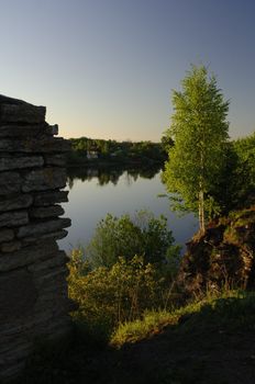 View on the river Volkhov. In the summer, early in the morning, a view on the river Volkhov from coast at an old fortress.