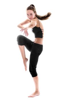 Young adult woman is dancing over white background