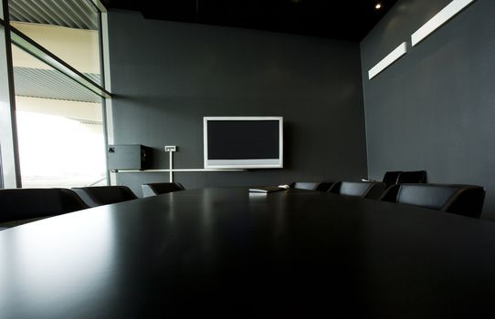 Interior of a modern conference room with TV