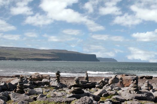 rock piles on the beach in doolin county clare ireland