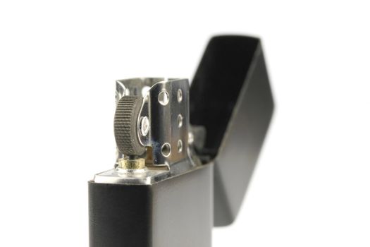 Black ZIPPO type lighter on a white background
