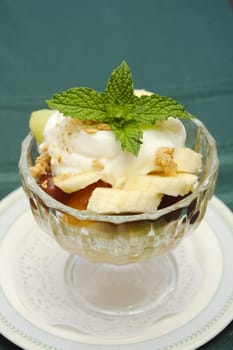 Healthy breakfast of fruit, granola and yogurt