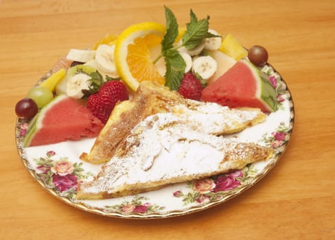 fruit dish with french toast for breakfast, a healthy start to the day