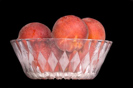 bowl of fresh colorful peaches 