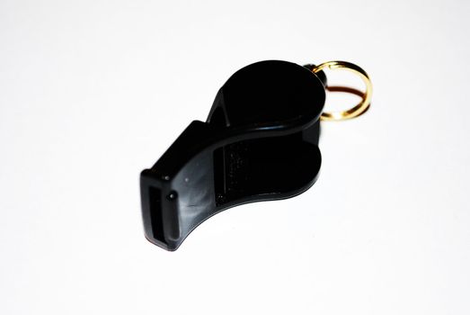 A black trill whistle.