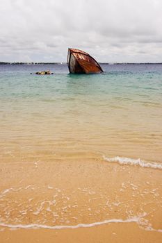 A shipwreck lies on the shore of Pangaimotu Island in Tonga - making it an ideal place to snorkel and dive.