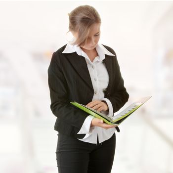 Young caucasian businesswoman in suite