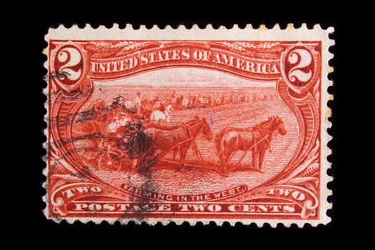 UNITED STATES - CIRCA 1898  : Image depicting farmers, with inscription "Farming in the West" , and a face value of 2 cents, series circa 1898