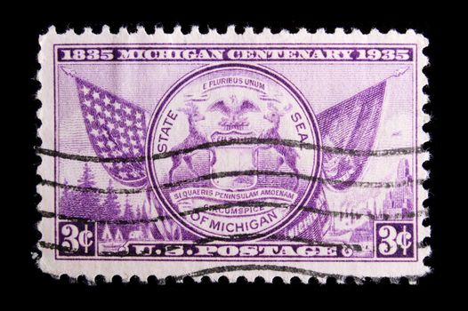 UNITED STATES - CIRCA 1935: Image depicting MICHIGAN State seal, with  inscription "1835 Michigan Centenary 1935" and "State Seal of Michigan" ,with a face value of 3 cents, circa 1935
