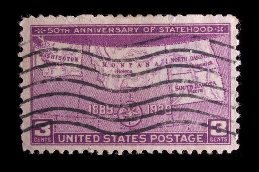 UNITED STATES- CIRCA 1939: Depicting Map of states, with inscription "50th Anniversary of Statehood" and "1889-1939", color magenta, face value 3 cents, circa 1939