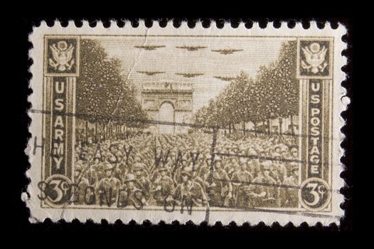 UNITED STATES- CIRCA 1945: Depicting soldiers on Champs elysee, with inscription "US Army", color brown, face value 3 cents, circa 1945
