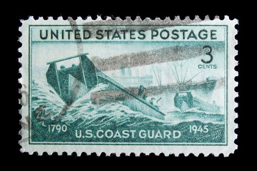 UNITED STATES- CIRCA 1945: Depicting boat, with inscription "1790 U.S. Coast Guard 1945", color green, face value 3 cents, circa 1945 