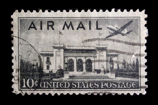UNITED STATES - CIRCA 1941: depicting transport plane and building, inscripted , face value 10c, circa 1941