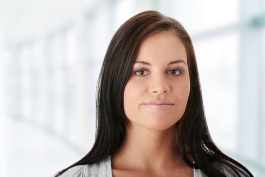 Young woman (student or businesswoman) portrait. Isolated on white background