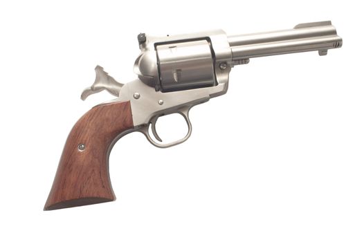 cocked stainless steel revolver  isolated on a white background