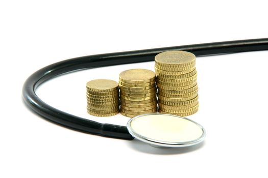 stethoscope and money isolated on white background healthcare and finance concepts