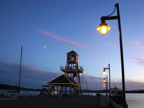 Sunset at wharf on Memphremagog Lake in Magog, Province of Quebec, Canada