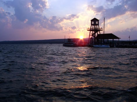 Sunset at wharf on Memphremagog Lake in Magog, Province of Quebec, Canada