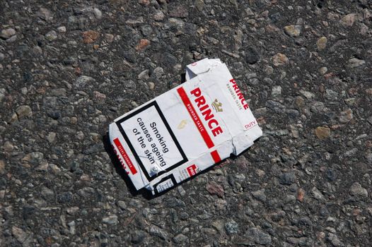 Empty cigarette packet trown on the ground