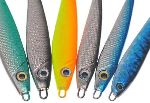 Collection of fishing lures on white background