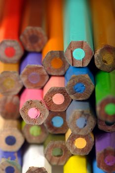 Macro image of the ends of used colouring pencils. Very shallow depth of field with the focus on the middle pencil.
