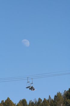 Lovely moon with Ski lift below.