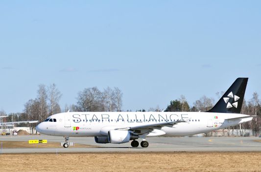 Airliner on the runway at gardermoen airport