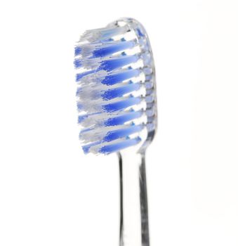 Clear toothbrush isolated on white background, closeup
