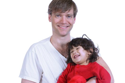 Handsome father holding his toddler, father is caucasian and son is part asian, part Scandinavian