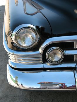 Image of the front right fender showing the headlights of a 1950 Cadillac.