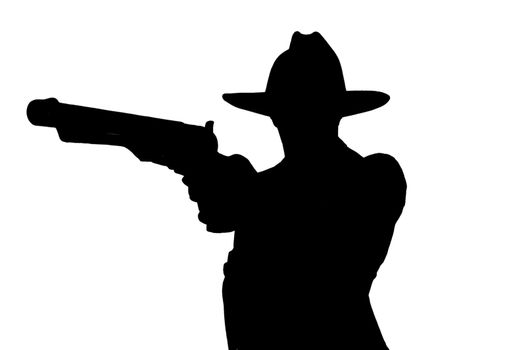 silhouette of cowboy with gun