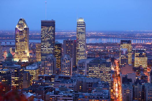 Montreal skyline by night. Dusk cityscape image of Montreal downtown, Quebec, Canada.