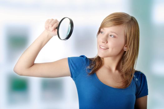 Student girl with magnifier