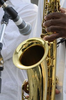 saxophonist playing in live concert