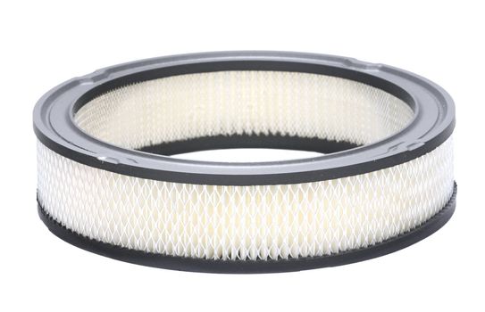 A round automotive air filter isolated on a white background
