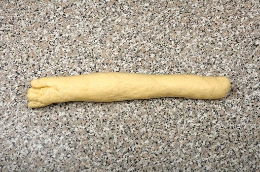 dough on a granite table