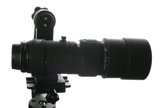 A 300 mm lens mounted onto a gimbal style tripod head