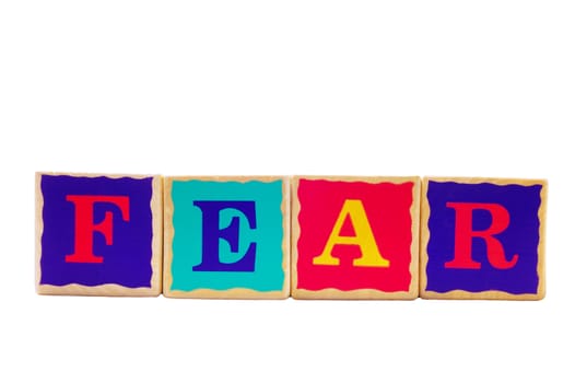 childrens play blocks spelling 'fear'
