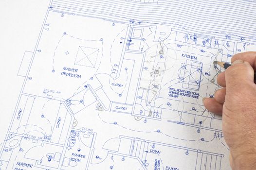 Architect making changes to house plans