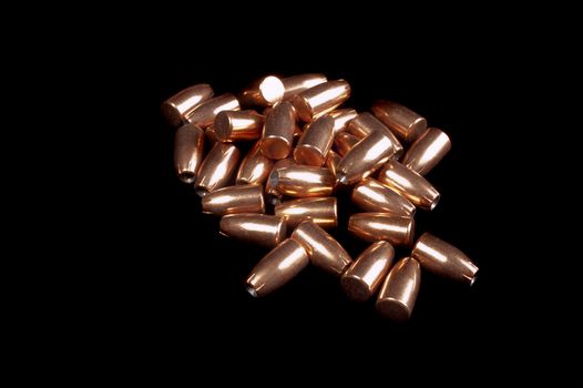 9 millimeter, 147 grain hollowpoint bullets on a black background