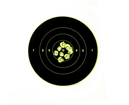 bullet holes in targets displaying precision shooting and demonstrating accuracy of firearm
