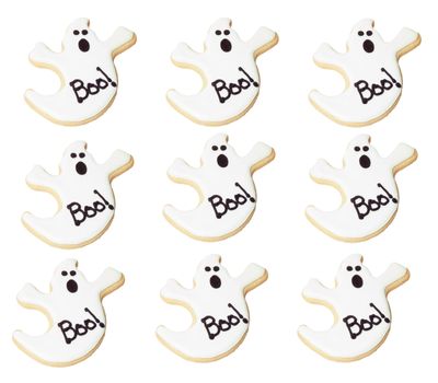 Group of white ghost cookie treats on a white back ground